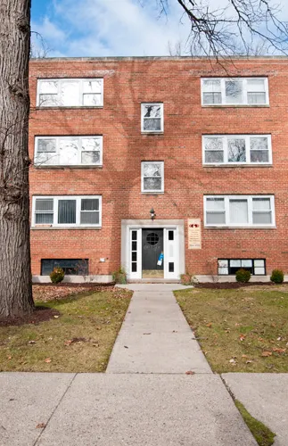 front entrance door with grass walkway at 2321 Central Apartments