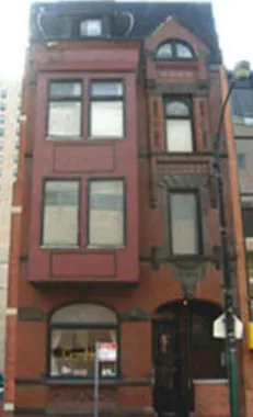 exterior red brick facade of vintage 814 N. State Apartments