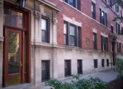 entrance with limstone surround at 707-717 W Wellington / 2951-2953 N Clark