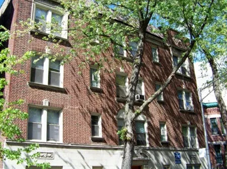 exterior brick front of 640 W. Briar Apartments