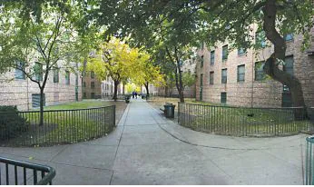 exterior courtyard walkway at Marshall Field Garden Apartments in Old Town