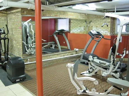 courtyard  and red brick facade of 2121 Ridge Apartments