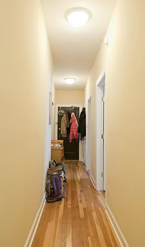 red brick exterior of the the streetside of 2247 Ridge Apartments