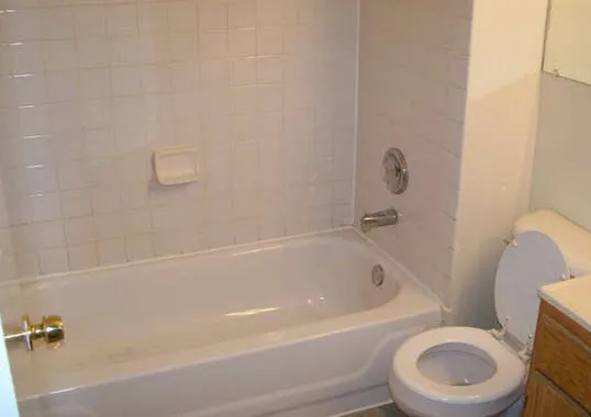 tan brick street exterior and entrance of 4737 South Ingleside Apartments