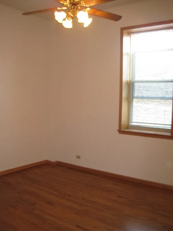 across the street with trees and cars at 2375 W Montana Apartments