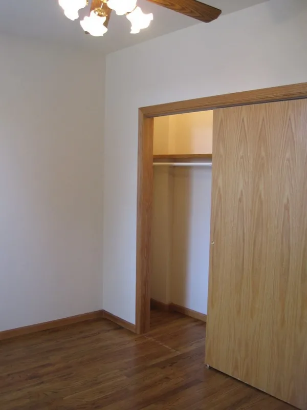 across the street with trees and cars at 2375 W Montana Apartments