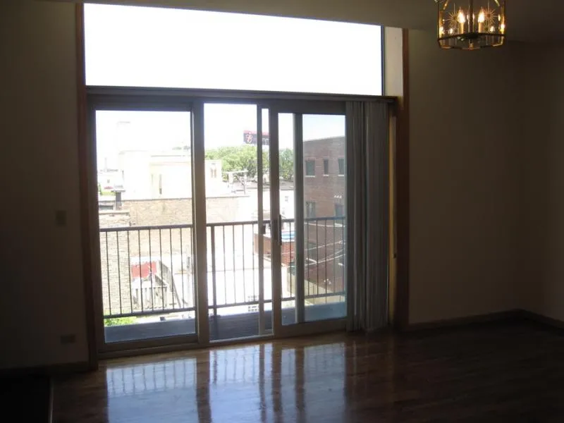 across the street with trees and cars at 2375 W Montana Apartments
