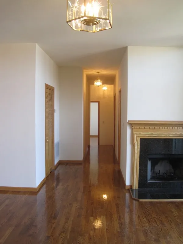 across the street with trees and cars at 2375 W Montana Apartments