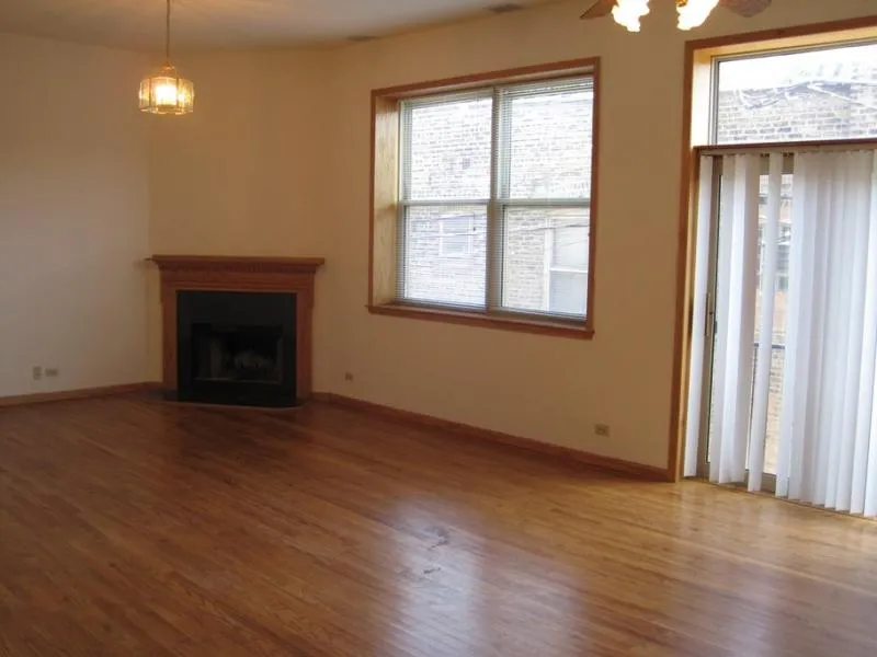 across the street with trees and cars at 2375 W Montana Apartments