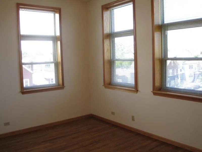 across the street with trees and cars at 2375 W Montana Apartments
