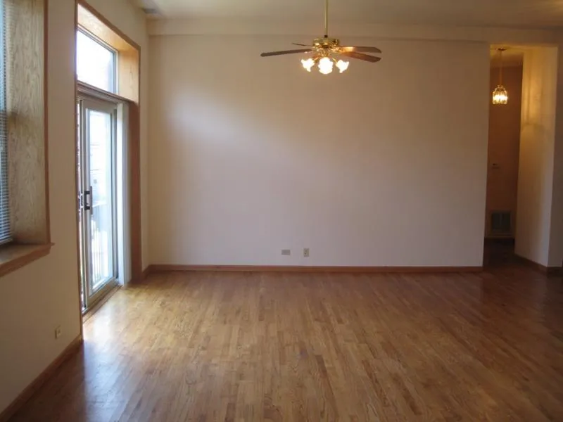 across the street with trees and cars at 2375 W Montana Apartments