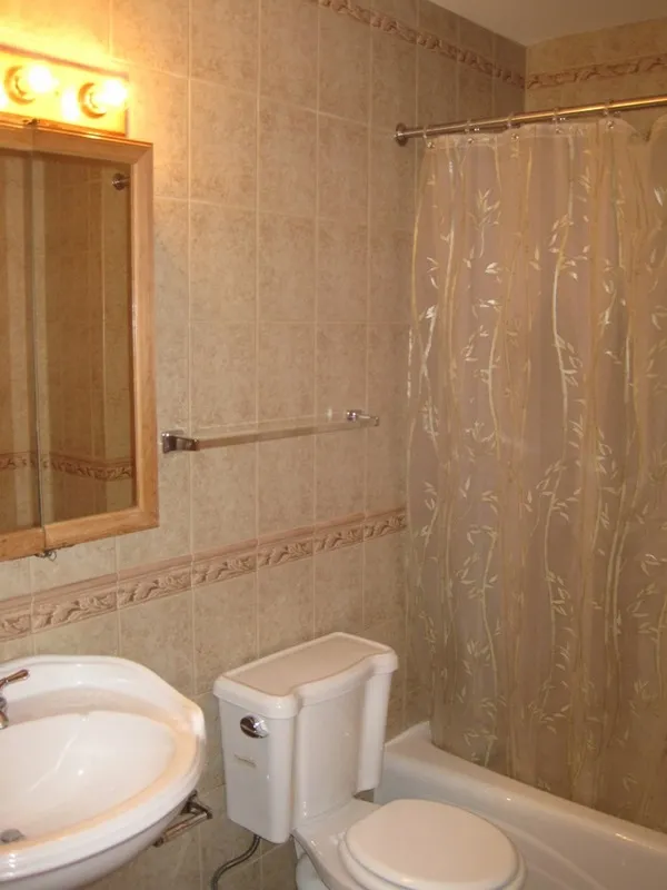 across the street with trees and cars at 2375 W Montana Apartments