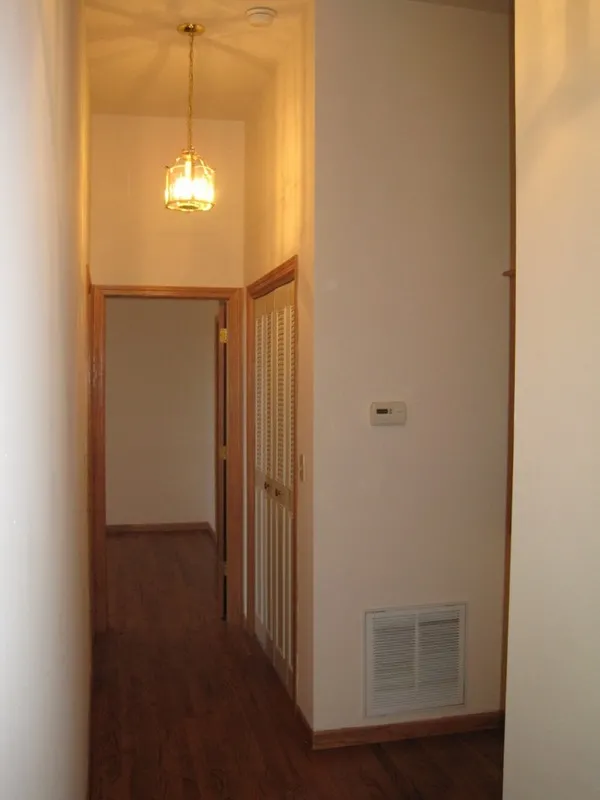 across the street with trees and cars at 2375 W Montana Apartments