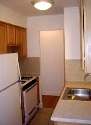 exterior with trees at 5250 N Sheridan Apartments in Chicago