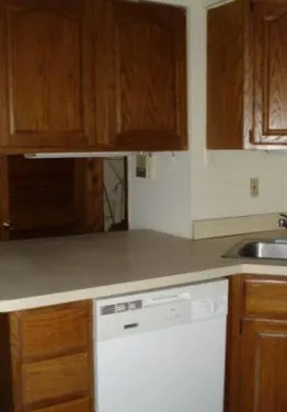 exterior red brick facade of vintage 814 N. State Apartments