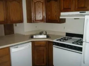 exterior red brick facade of vintage 814 N. State Apartments