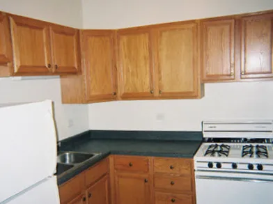 view from street of the brick facade of 4500 North Malden Apartments 