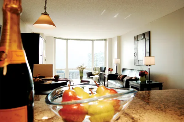 flowers surround the entrance of The Park Evanston Apartments in Evanston