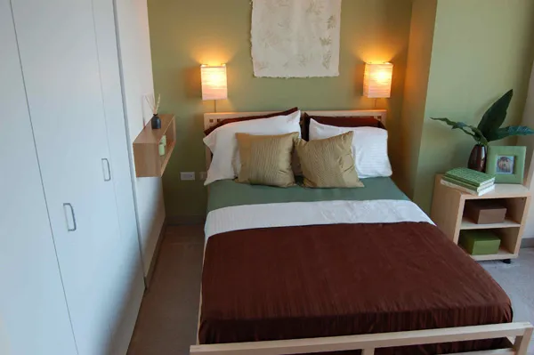 flowers surround the entrance of The Park Evanston Apartments in Evanston