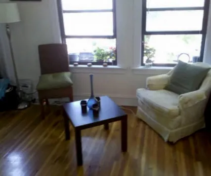 corner sreet view of red brick exterior of 815-823 West Bradley Apartments