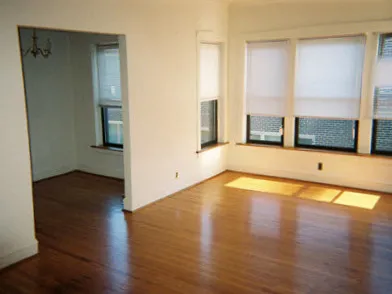 view from street of the brick facade of 4500 North Malden Apartments 