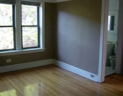metal gate and landscaped courtyard at The Edward Apartments