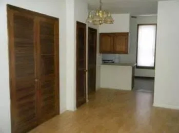 exterior red brick facade of vintage 814 N. State Apartments