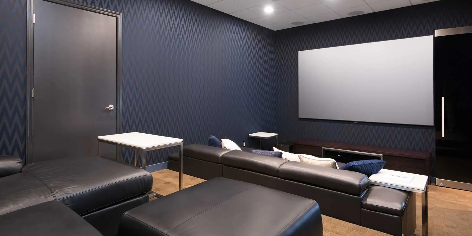 model living rooms with view at Luxe on Madison Apartments