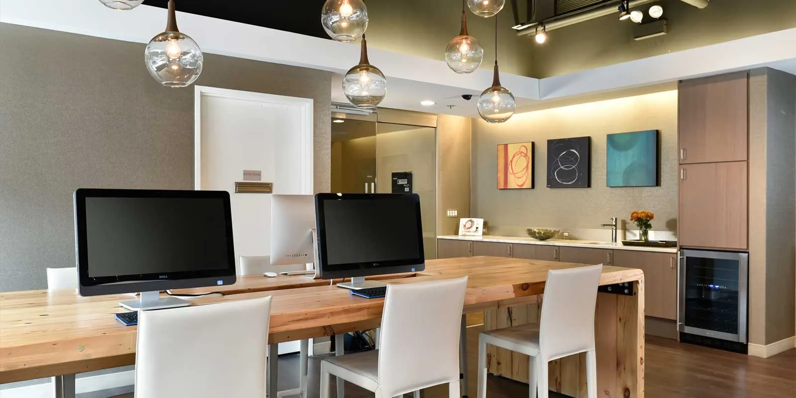 model living rooms with view at Luxe on Madison Apartments