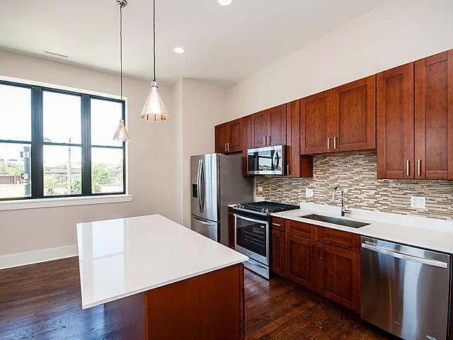 Kitchen with light cabinets