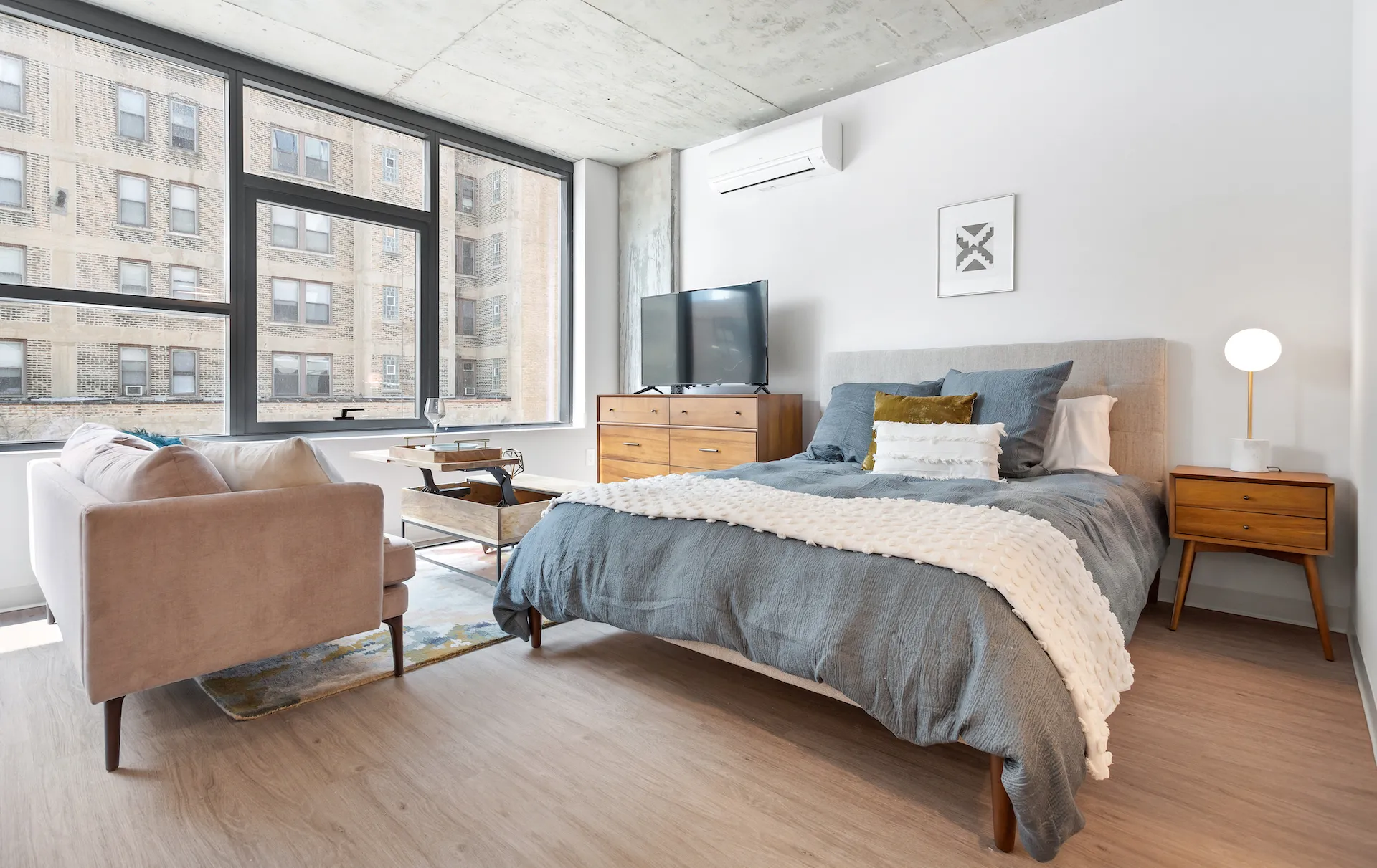 model furnished living room at Upshore Chapter Apartments