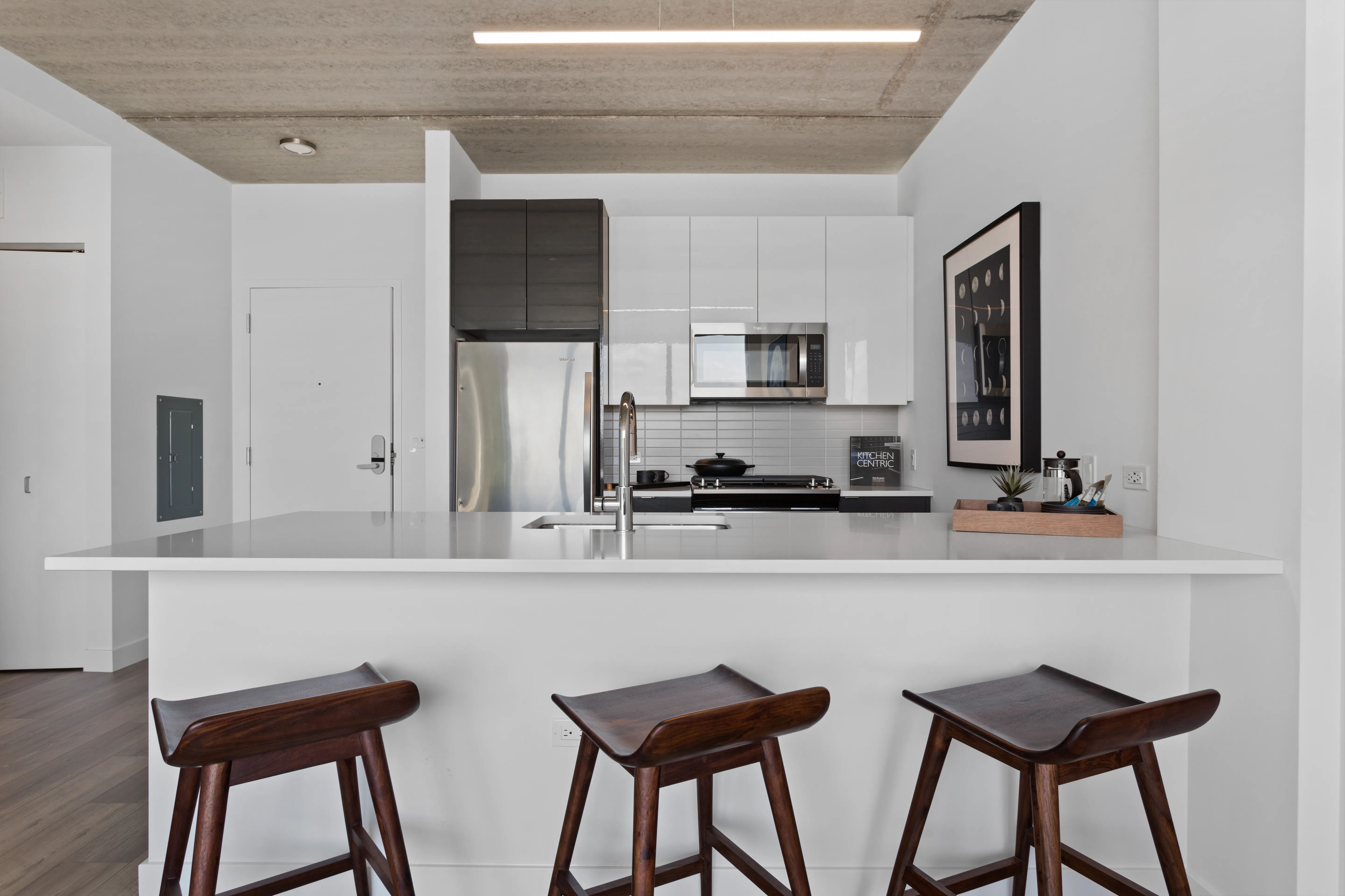 1 bedroom unit kitchen and living at Viridian on Sheridan Apartments