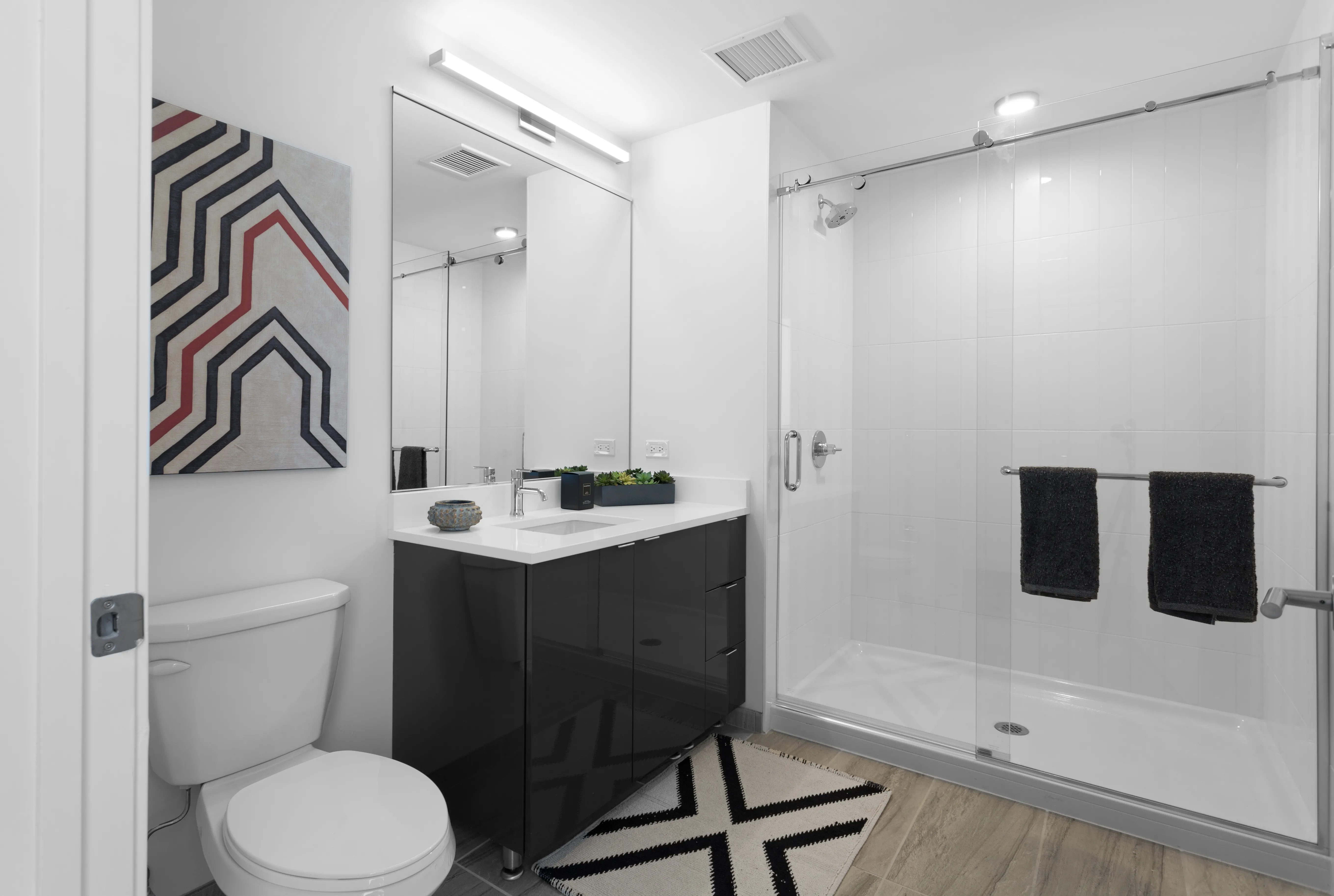 1 bedroom unit kitchen and living at Viridian on Sheridan Apartments