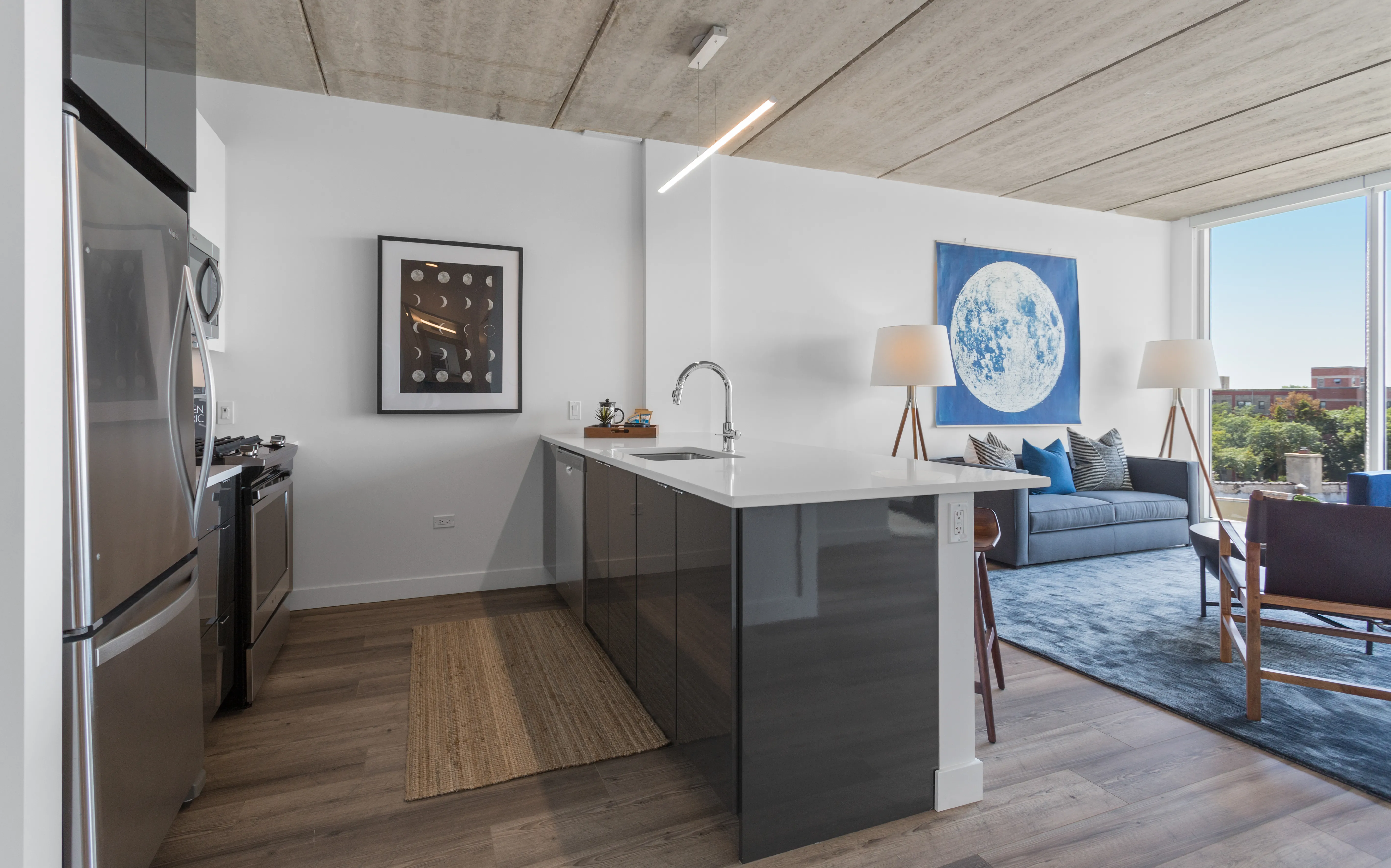 1 bedroom unit kitchen and living at Viridian on Sheridan Apartments