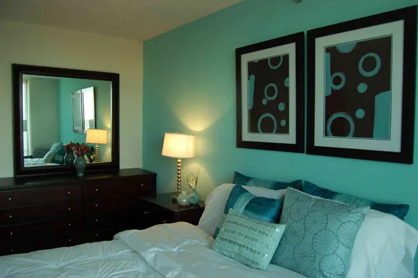 flowers surround the entrance of The Park Evanston Apartments in Evanston