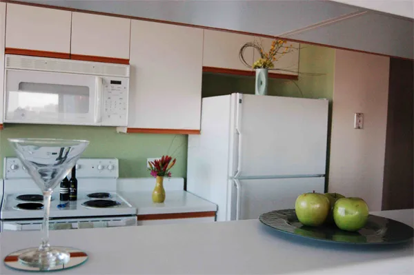 flowers surround the entrance of The Park Evanston Apartments in Evanston