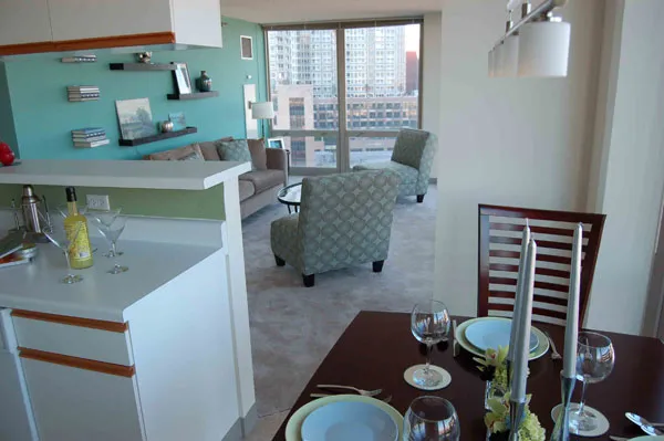 flowers surround the entrance of The Park Evanston Apartments in Evanston