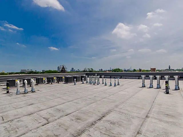glass backsplash, dishwasher in all units at RavenLux Apartments
