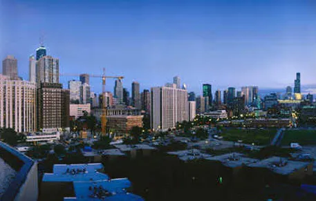 outdoor pool and building exterior at Atrium at Old Town Park Apartments