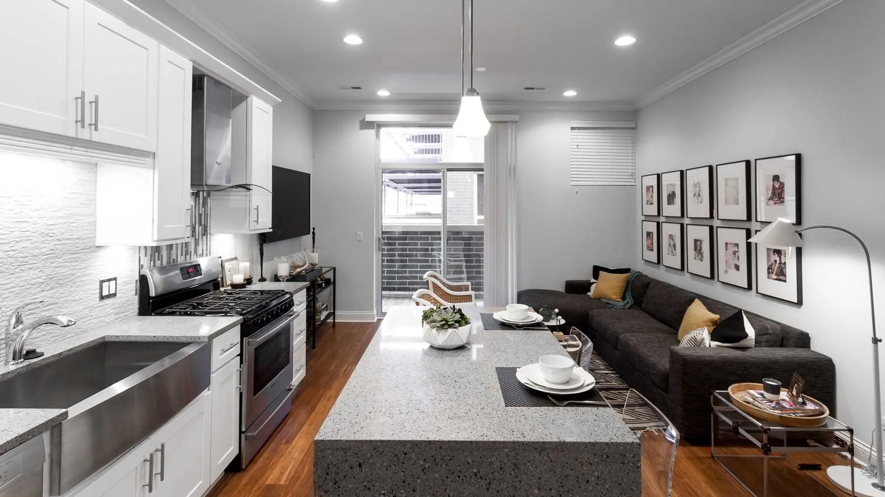 model living room unit at Madison Throop Place Apartments