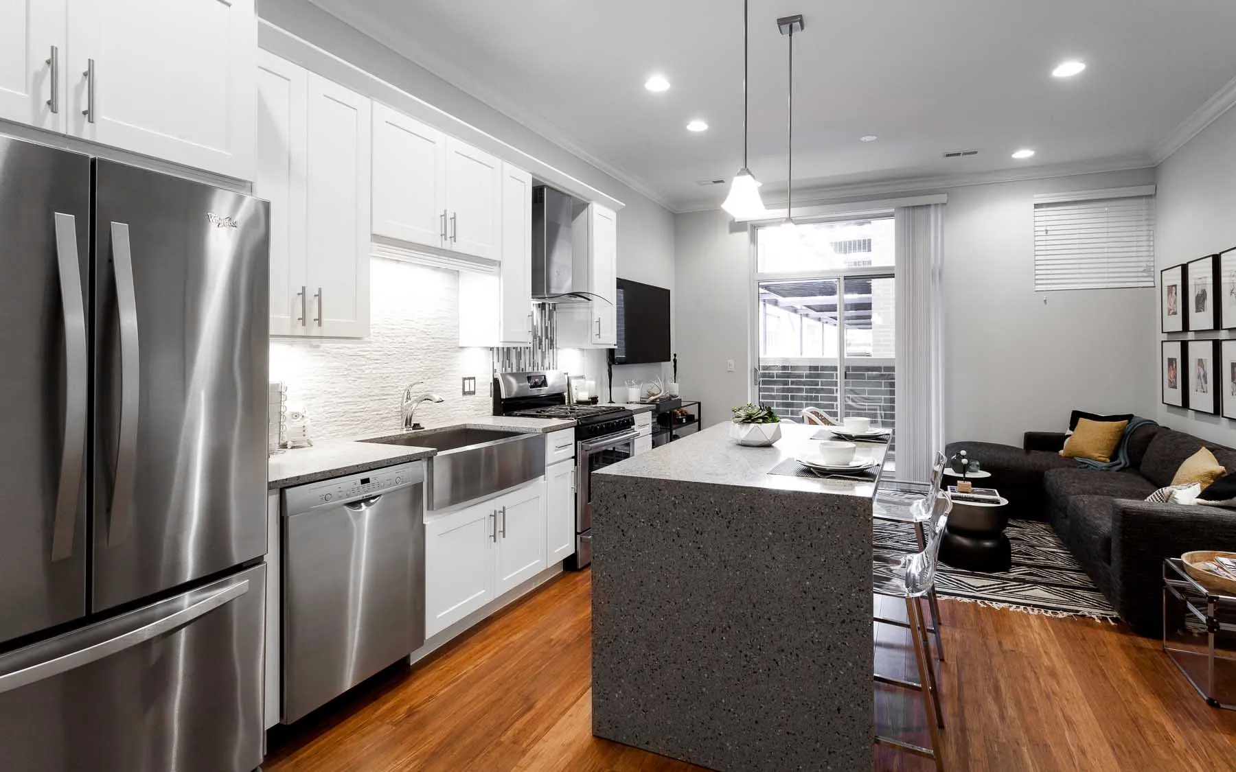 model living room unit at Madison Throop Place Apartments