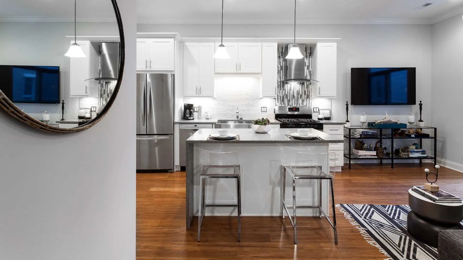 model living room unit at Madison Throop Place Apartments