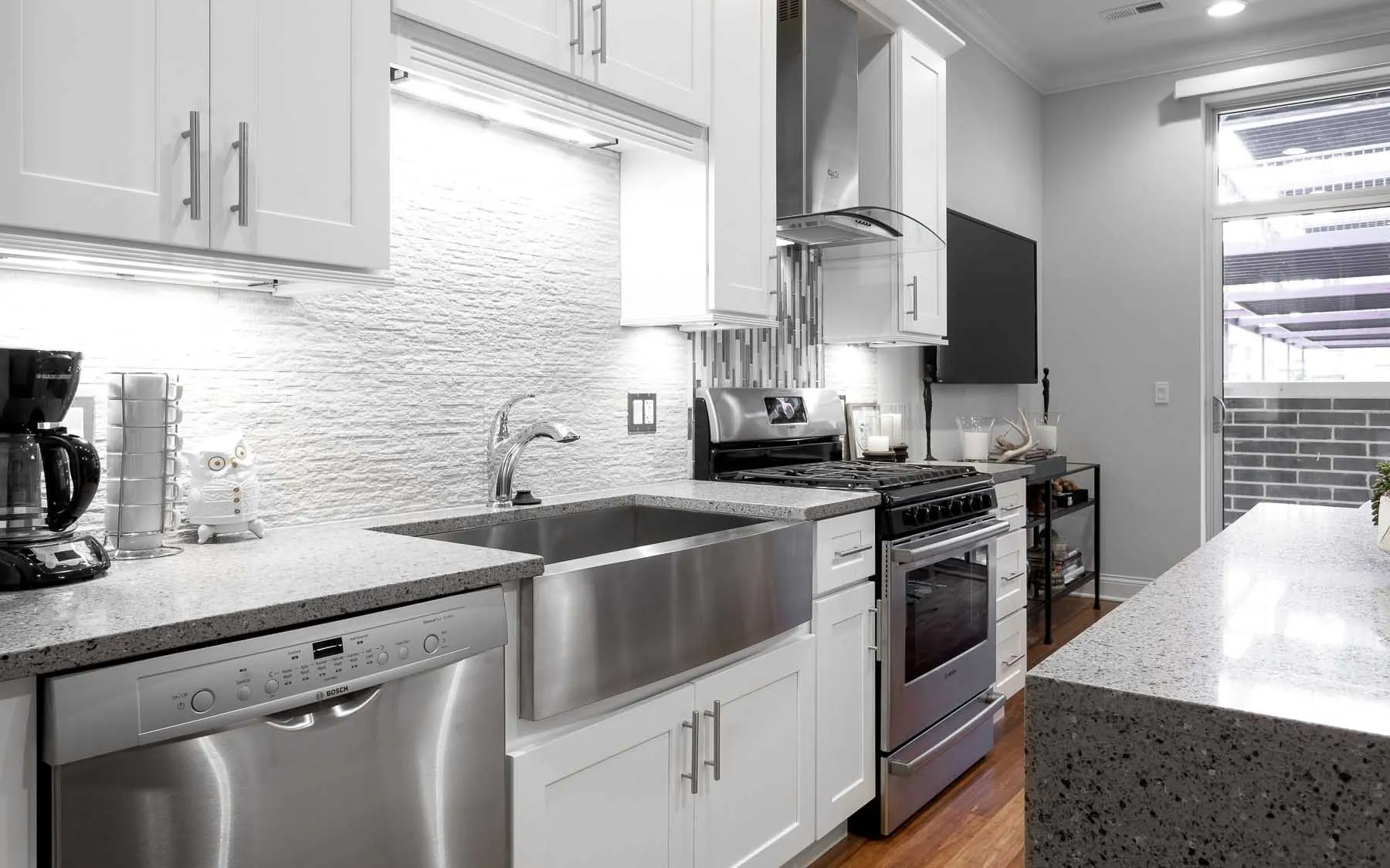 model living room unit at Madison Throop Place Apartments