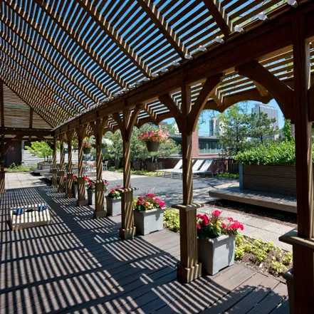street entrance of Reside on Wellington Apartments in Lakeview Chicago