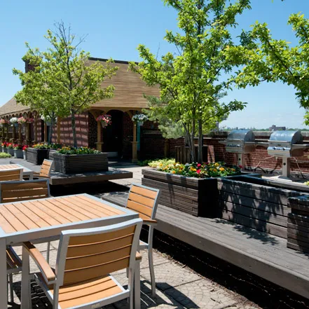 street entrance of Reside on Wellington Apartments in Lakeview Chicago
