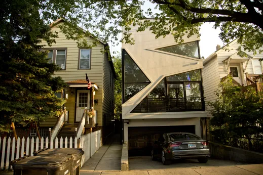 Audi A7 parked in the driveway of modern house on Near West Side Chicago