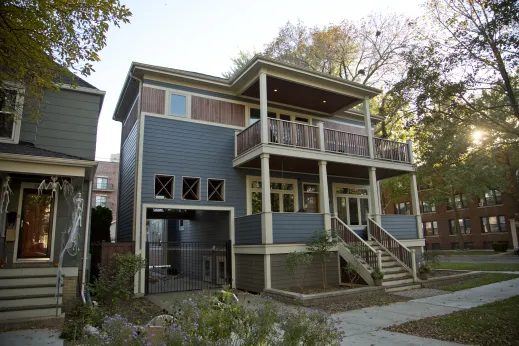 front of blue apartment building with balcony near halloween in Bowmanville Chicago