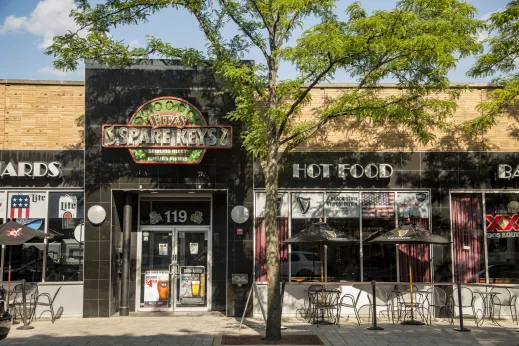 bowling alley store front with trees in front in Elmhurst Illinois