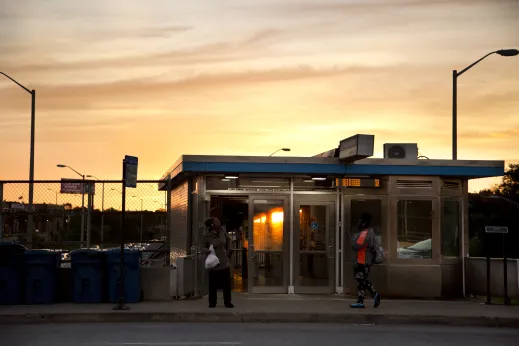 CTA Blue Line station entrance at Kedzie Homan by apartments in North Lawndale Chicago