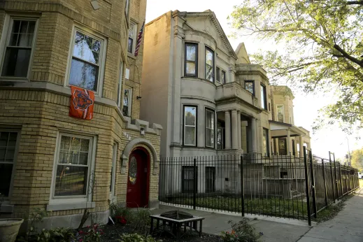 Chicago Bears flag hanging from apartment window in Washington Park Chicago